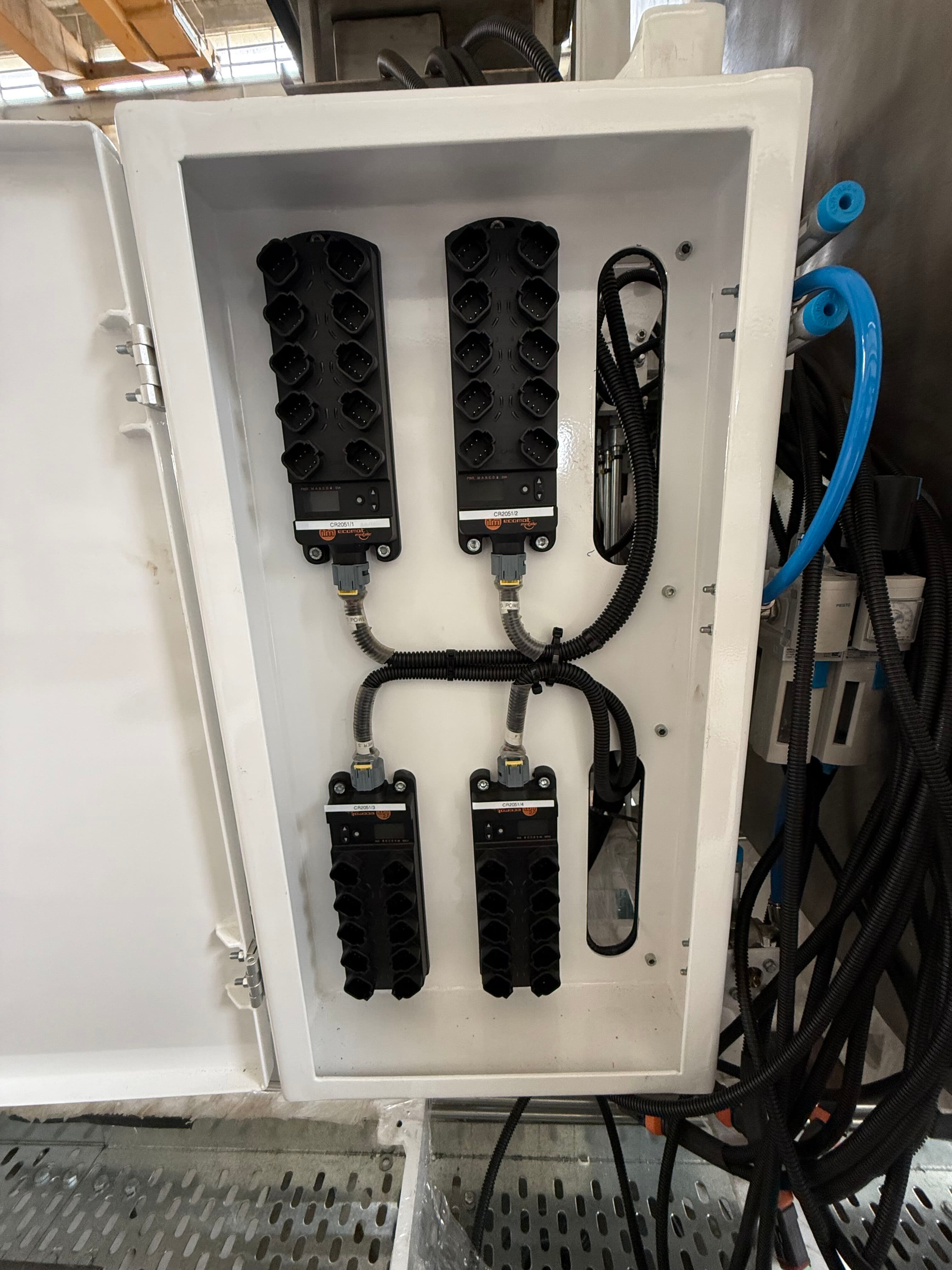 ifm ecomat distributed I/O modules with M12 connectors in a sealed enclosure